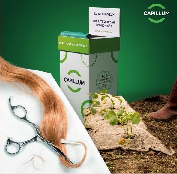 Collecte Capillum : boîte de recyclage des cheveux, ciseaux et mèche sur une bande de culture
